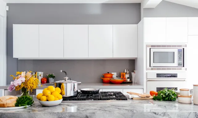 Marble kitchen countertop with gas cooktop