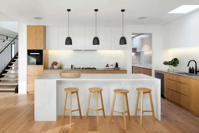 Kitchen island with quartz waterfall countertop